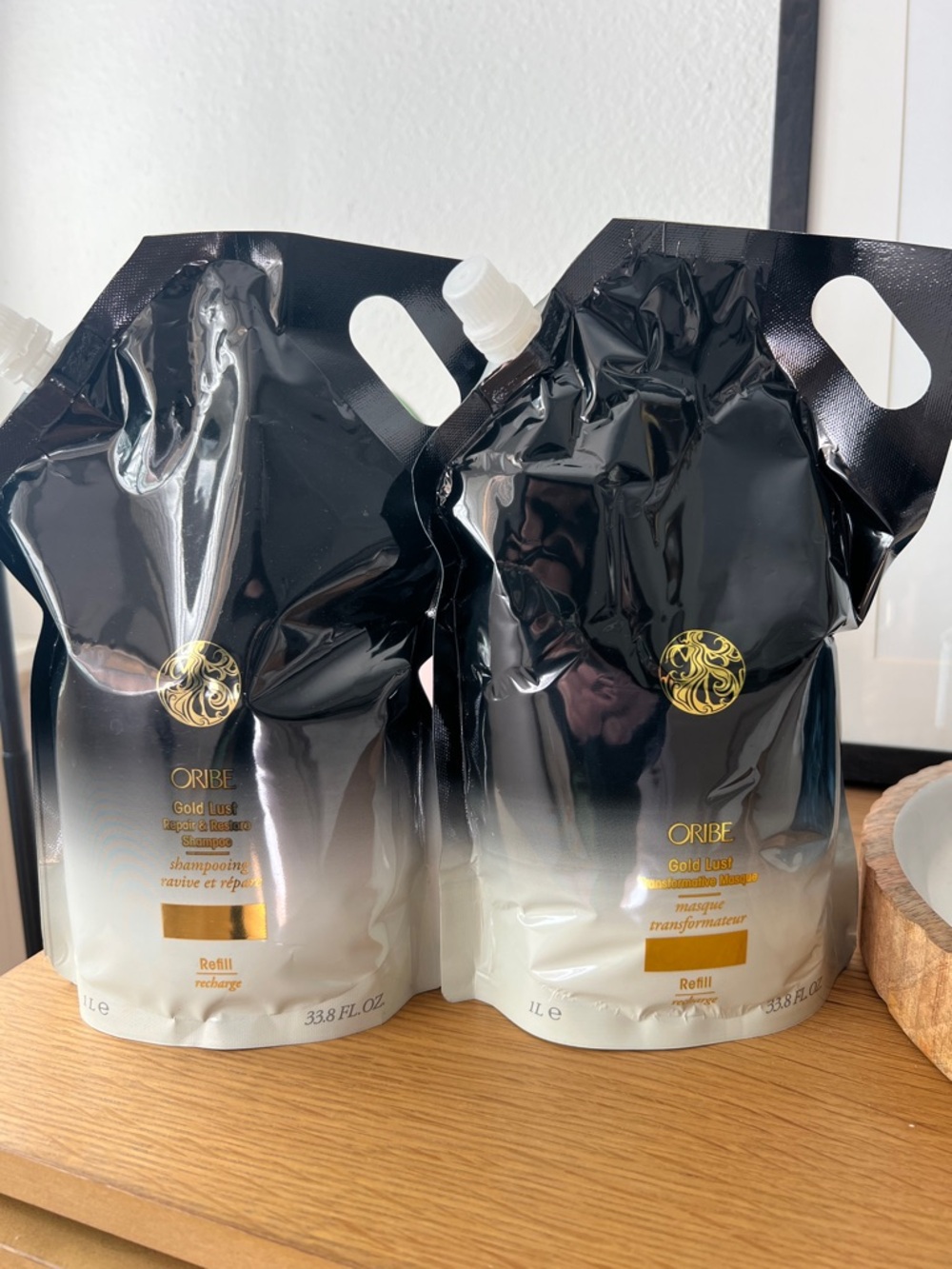 Oribe Gold Lust Masque and Shampoo Refill pouches.
1Le  33.84 ounce each-New